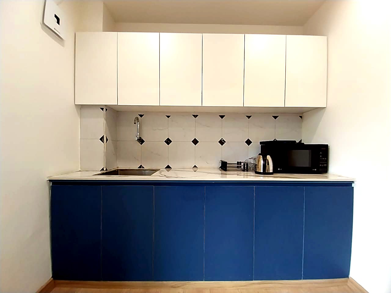 Fully-equipped pantry and kitchen at Worksiva Gurugram